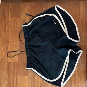 Outlined black nike shorts